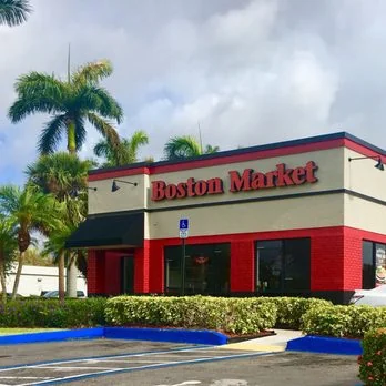 A Boston Market restaurant under palm trees in South Florida